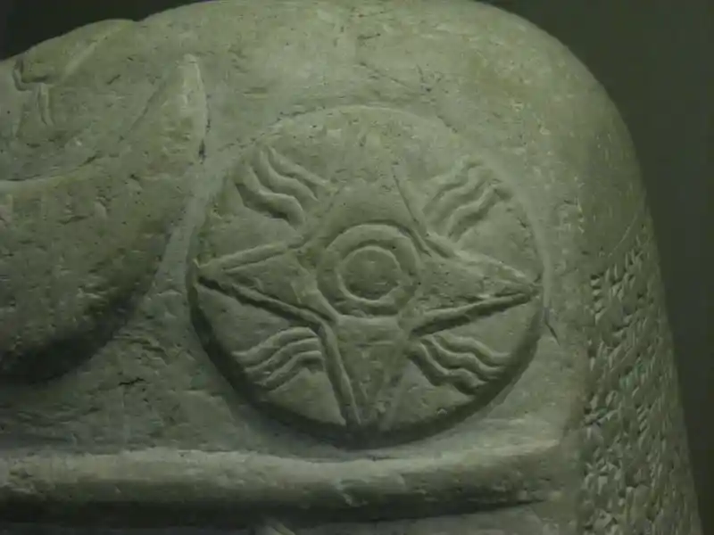 Cross on a solar disc on a Babylonian boundary stone